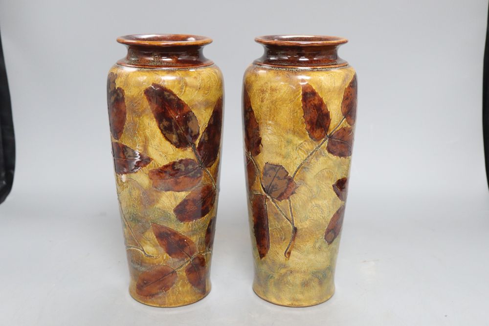 A pair of Doulton stoneware vases